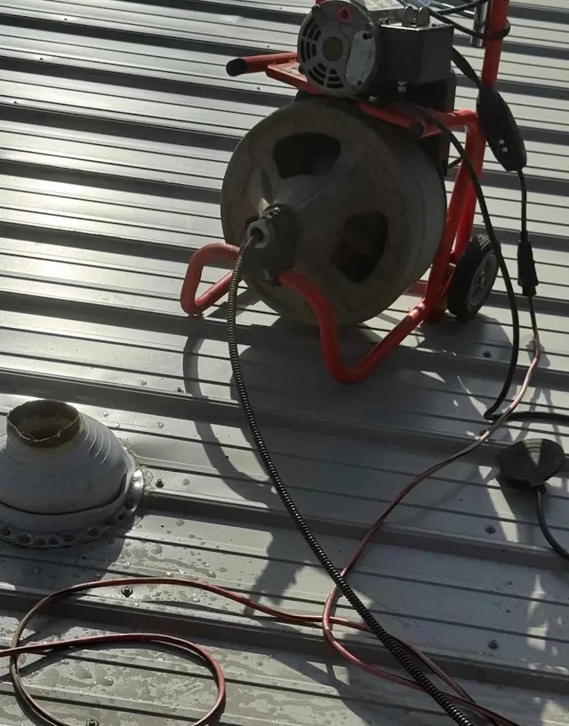 High-level sewer cleaning equipment on a residential job