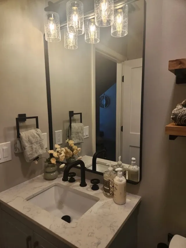 Matte black bathroom faucet installation