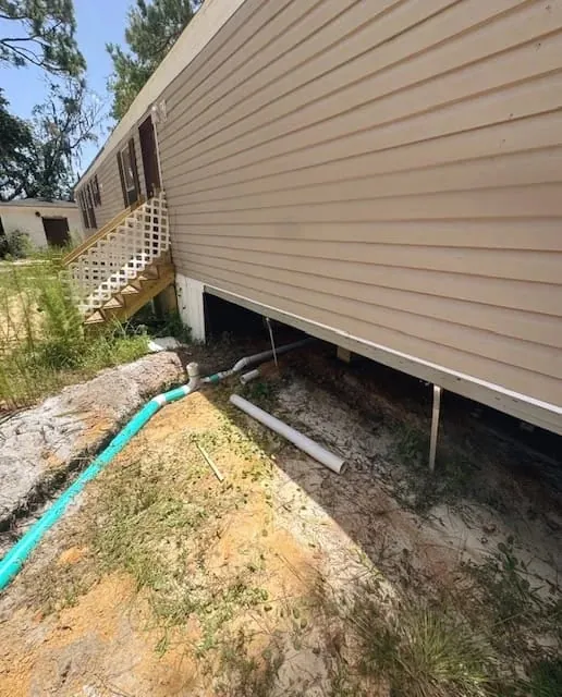 Sewer line connection at the house foundation