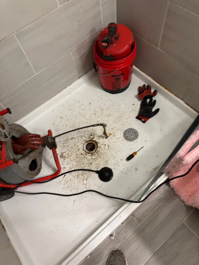 Shower drain cleaning service